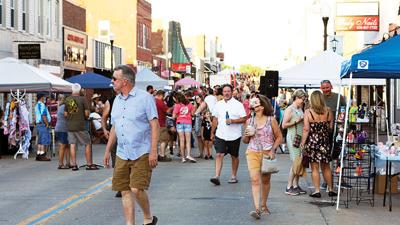 The streets are packed and spectators are trying to decide which booth to go to next during the Tanglefoot SummerFest held June 18 in Festus and Crystal City.