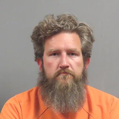 Trial set for De Soto-area man accused of holding family hostage, killing dogs