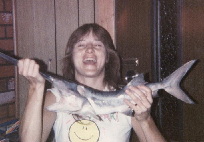 Tressa Nelson placed second in the contest with a picture of herself holding a spoonbill she caught.