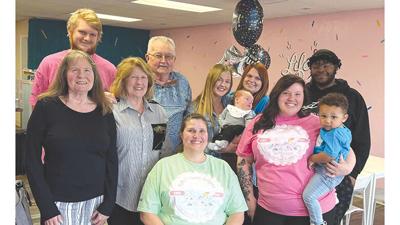 From left are Alice Weakley, Marshall Steffan, Linda and Frank Stampehl, Nyree Frishkorn, Kyleigh Ojile holding Kolsen Patterson, Jade Ojile, Alexis Thost holding Jakari, and Torean Graves.