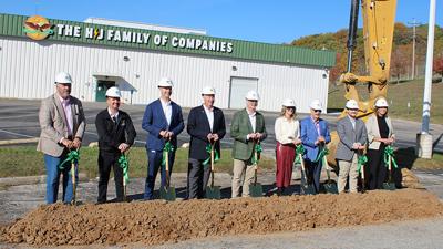 From left are County Executive Dennis Gannon, state Rep. David Casteel, Kaizen manager Jeffrey Evitts, vice president of Manufacturing Henry Evitts, president Jay Shekelton, Lesley Shekelton, founder Jim Shekelton, production specialist Jason Shekelton ...