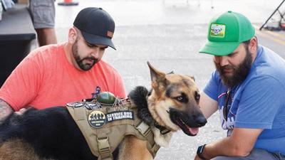 From left, Timothy Fresta and his friend, Jonathan Hendershot, with Jared.