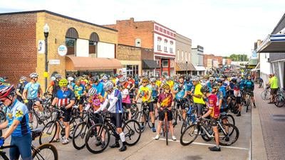 Festus Main Street is packed with bicyclists for the 2024 Bottleneck Bridge Ride.