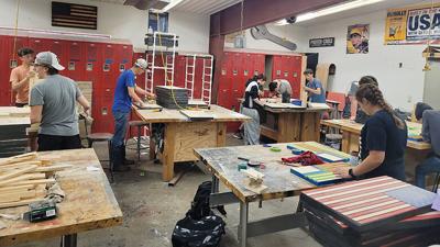 Students in Fox High School’s advanced woodworking technology class use the school’s workshop, which will get a new electrical system to support its dust system.