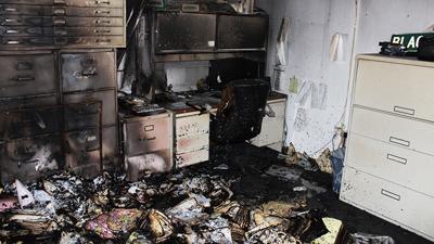 Papers were strewn across the floor in Herculaneum City Hall following a fire there this morning.