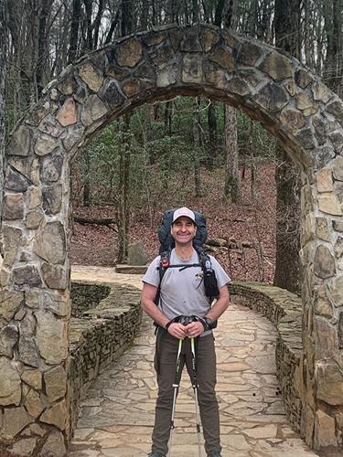 John Leech begins his journey at the Arch at Amicalola Falls State Park in Georgia, which is the unofficial start of the trail.