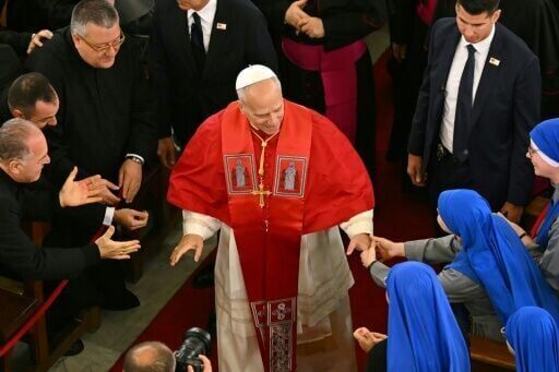 Inside Istanbul's Cathedral of the Holy Spirit, Pope Leo XIV smiled, looking considerably more at ease as he greeted the faithful