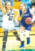 Northwest cagers take it on chin at Marquette