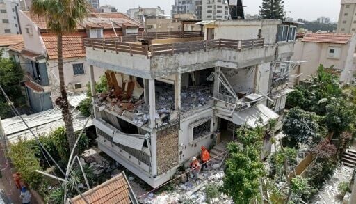 A damaged building from an Iranian strike in a residential part of Israel's city of Tel Aviv