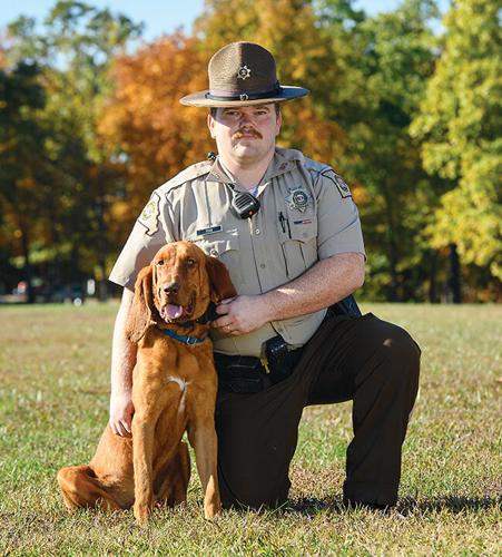 Deputy Josiah Tegg with his canine, Scout.