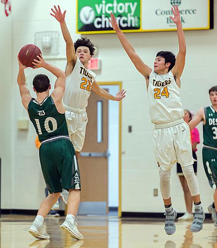 Clayton Snudden, De Soto; Daniel Portell and Kobe Branscomb, Festus