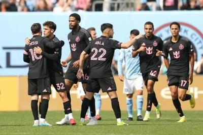 Lionel Messi, left, celebrates with Inter Miami teammates after scoring a goal in the MLS squad's 3-2 victory at New York City FC