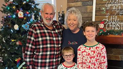 This photo was sent in last year of David and Patti McClelland with their grandkids, Kayden and Braxton Richards, on Christmas morning.