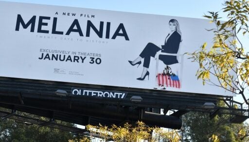 A billboard advertising the film “Melania” is seen vandalized in Southern California