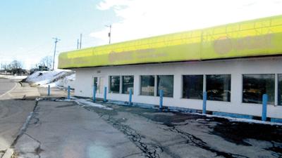 triangle-shaped lot next to Jeffco Boulevard,