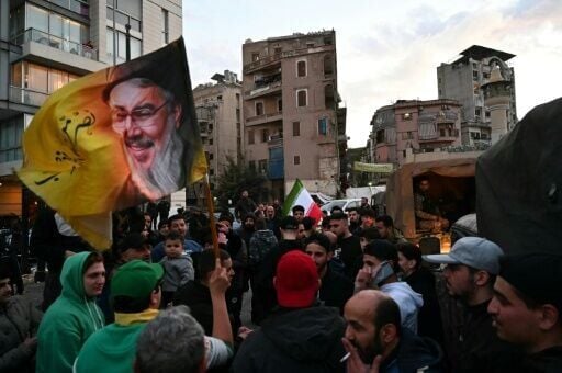Hezbollah supporters in Beirut protest the Lebanese government's decision to engage in direct negotiations with Israel