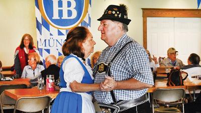 A couple dances at Oktoberfest last year.