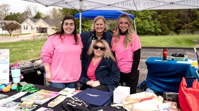 Back, from left, Jefferson County Health Department staff members Shari Lexa, adult brain injury program coordinator; Mary Kenney, dental hygienist; Cora Poliette, public health nurse; with Ashley Proffitt, nursing supervisor; at a community event in Ap...