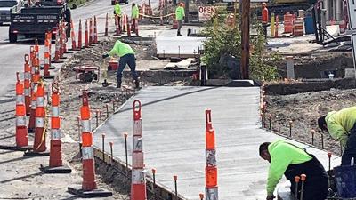 Crews work on the intersection of Jeffco and Tenbrook Road in Arnold.