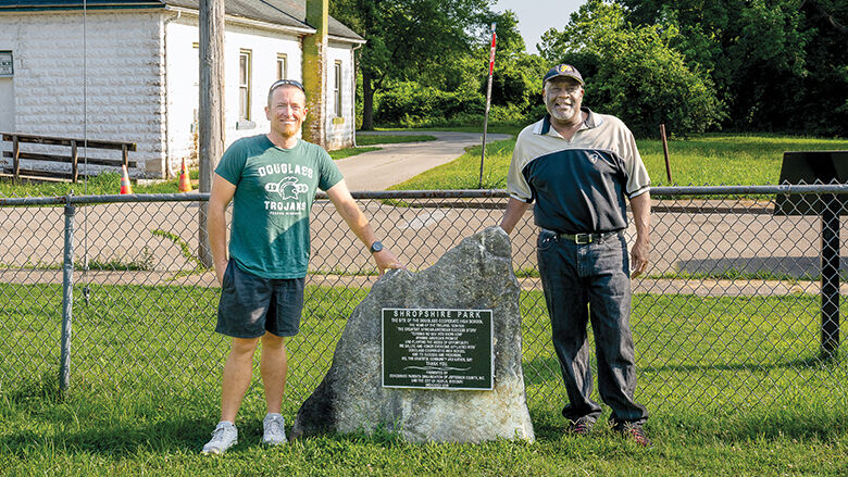Festus Middle School teacher Tim Krysl, left, and Douglass Alumni Association president Ron Herrington Jr. at Shropshire Park.