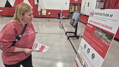 Anna Tostado reviews the Fox C-6 School District’s planned improvements for Fox High School on Feb. 24 at Fox Middle School during an open house the district held to provide information about a $48 million bond issue.