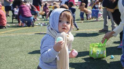 Keelin Luecke, then 1, of Imperial collects Easter eggs at the the Arnold Chamber of Commerce’s annual Eggstravaganza last year.