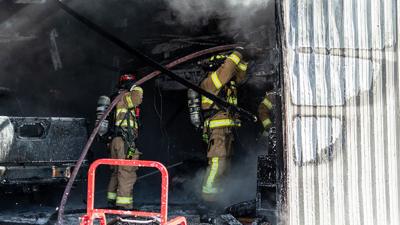 This garage on Old Sugar Creek Road was extensively damaged by fire Thursday morning.