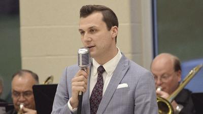 Missouri Big Band voclaist Joe Scalzitti performs at an event in June.