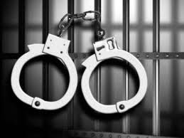 handcuffs and jail bars