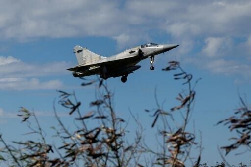 A Taiwan Air Force Mirage 2000 fighter jet takes off at Hsinchu Air Base in Hsinchu on December 29, 2025