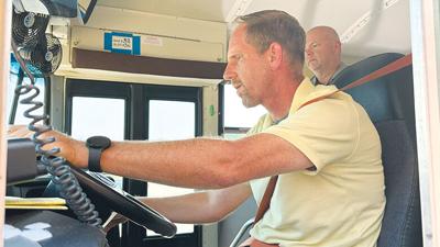 Leader reporter Tony Krausz learned it is not as difficult to drive a school bus as he thought during the Fox C-6 School District Bus Driver Recruitment Fair on July 29 at the Fox C-6 Service Center in Arnold.
