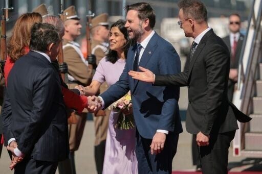 Hungarian Foreign Minister Peter Szijjarto welcomes US Vice President JD Vance and his wife Usha as they arrive in Budapest