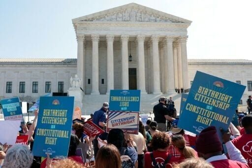 Demonstrators rally in support of birthright citizenship outside the US Supreme Court