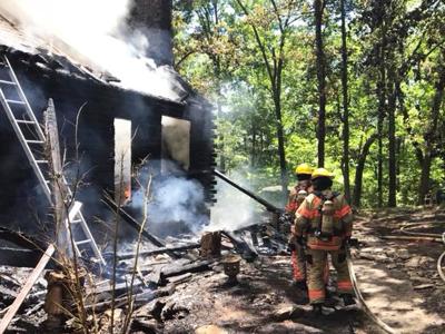 This log cabin at Lake Tishomingo was destroyed by fire Tuesday
