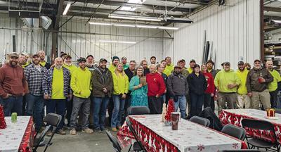 Presleys Glass employees at a holiday get-together.