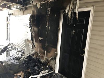 A fire in a breezeway at Walden Pond Apartments in High Ridge trapped a woman and her baby on a balcony until smoke could be cleared.