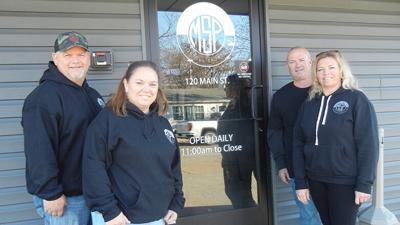 From left, Jamie and Tina Portell and Tom and Traci Moore own and operate Moortell Sports Pub.