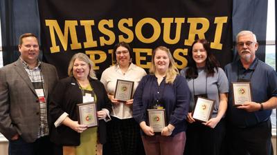 Pictured, from left, are Missouri Press Association President Bryan Chester, Leader Publisher Peggy Scott, Advertising Manager Katelyn Mary Skaggs, reporter Abby Stetina, advertising sales team member Alyssa Fitzgerald and Editor Gary Castor.