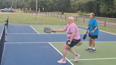 Front, Lei Morton, 52, who lives in the Arnold area, and Kathy Gallagher, 70, of south St. Louis County play pickleball on the new courts at Arnold City Park on Sept. 24.