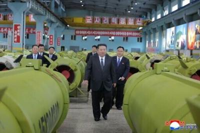 In a visit to munitions factories accompanied by top officials, the state-run Korean Central News Agency (KCNA) said Kim ordered the factories to prepare for a busy year ahead