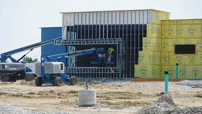 Construction crews work to finish the Michael J. Wiegand Justice Center in Eureka on July 15.