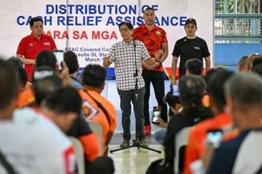 Philippine President Ferdinand Marcos Jr (C) delivers a speech during the distribution of a fuel subsidy to tricycle drivers in Manila on March 17, 2026. Oil climbed again in Asia on March 17 after prices retreated a day earlier, with investors remainin...