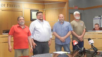 New Festus council members, from left, Rick Belleville, Dan Moore, Allen McCarthy and Karl Weekley, were sworn in on Monday.