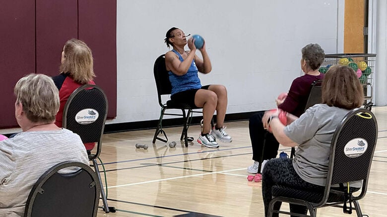Carol Lawrence, specialty group fitness instructor for the South County YMCA, is scheduled to be a guest speaker at the South County Senior Expo the morning of May 13 at the South County YMCA. She is shown leading a class.