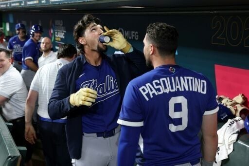 Italy's Jac Caglianone celebrates a home run with a shot of espresso, a ritual which has become part of the Azzurri's fairytale World Baseball Classic campaign
