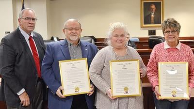 From left, Jefferson County Executive Dennis Gannon with outgoing County Council members Phil Hendrickson (District 3), Renee Reuter (District 2) and Vicky James (District 7).