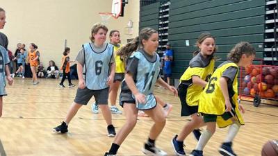 Fourth graders play a game during the first season of De Soto Youth Basketball.