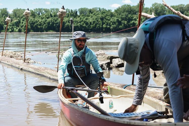 Max Wilson, left, and his father, Thomas Wilson, right, prepare to depart from Cooper's Landing (copy)