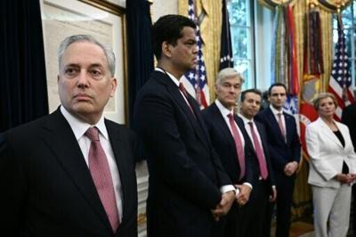 AI and crypto czar David Sacks looks on before US President Donald Trump signs executive orders on AI