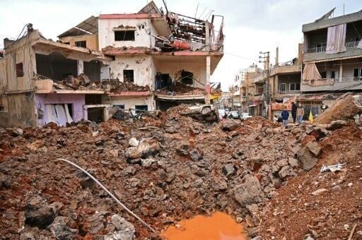 The explosions were powerful enough to send a car onto a building's second floor